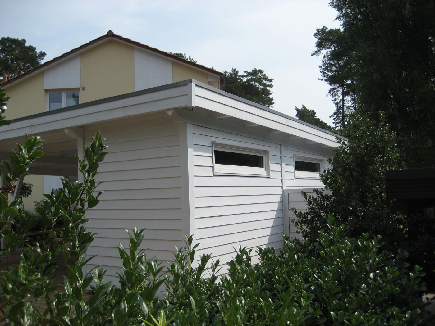 Carport Fassade mit Stülpschaling KSP 135